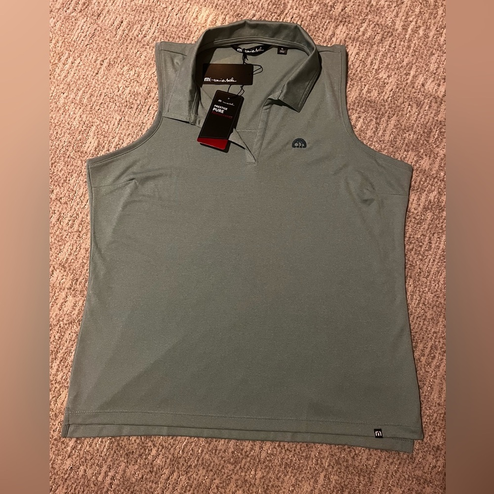 NWT green women’s Travis Mathews sleeveless polo